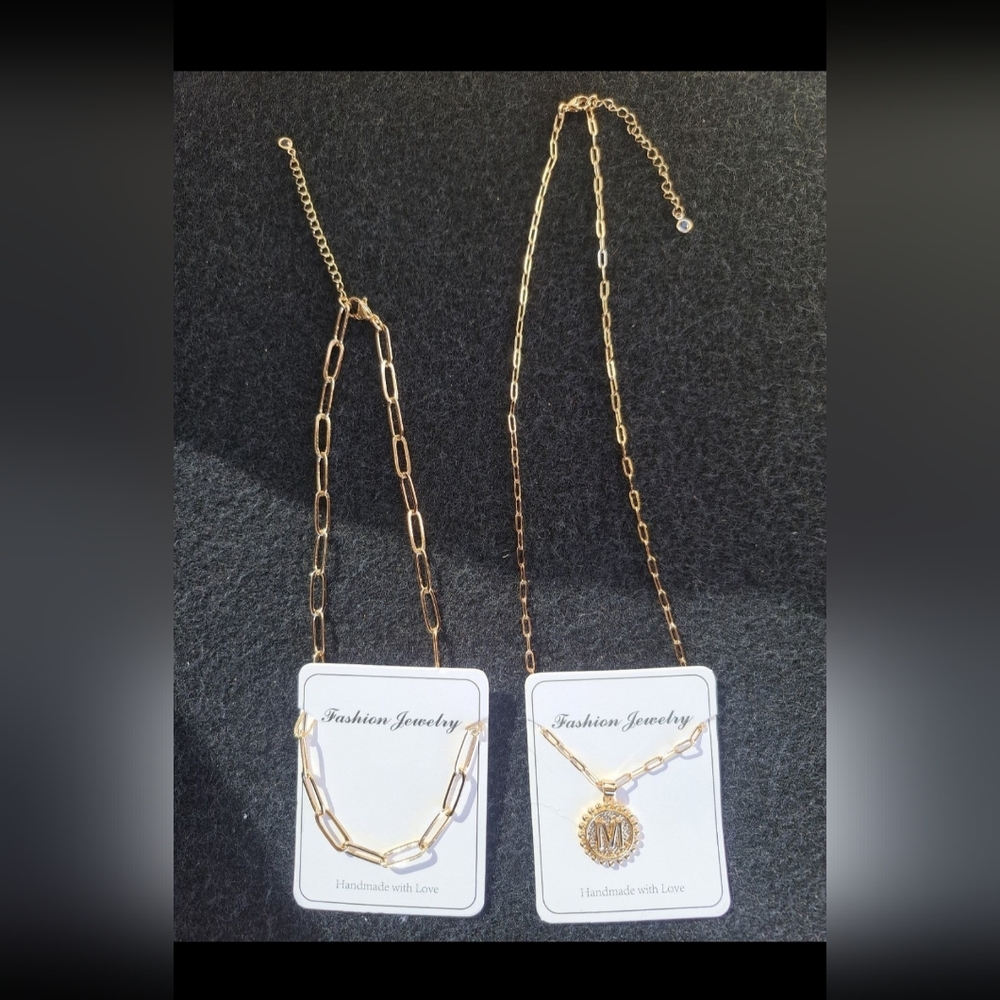 Two necklace and pendant with Letter "M".